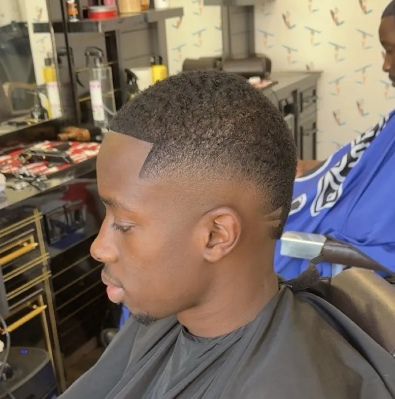 Coupe dégradé nette réalisée à Doumams Barber 95, Cergy