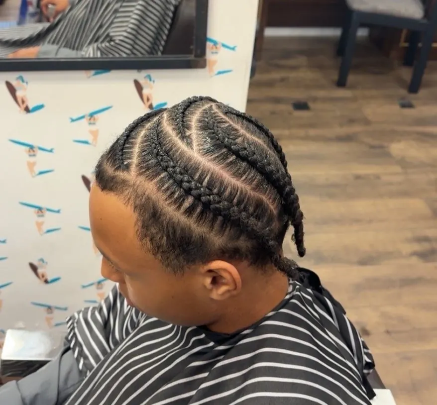 Nattes collées réalisées au salon